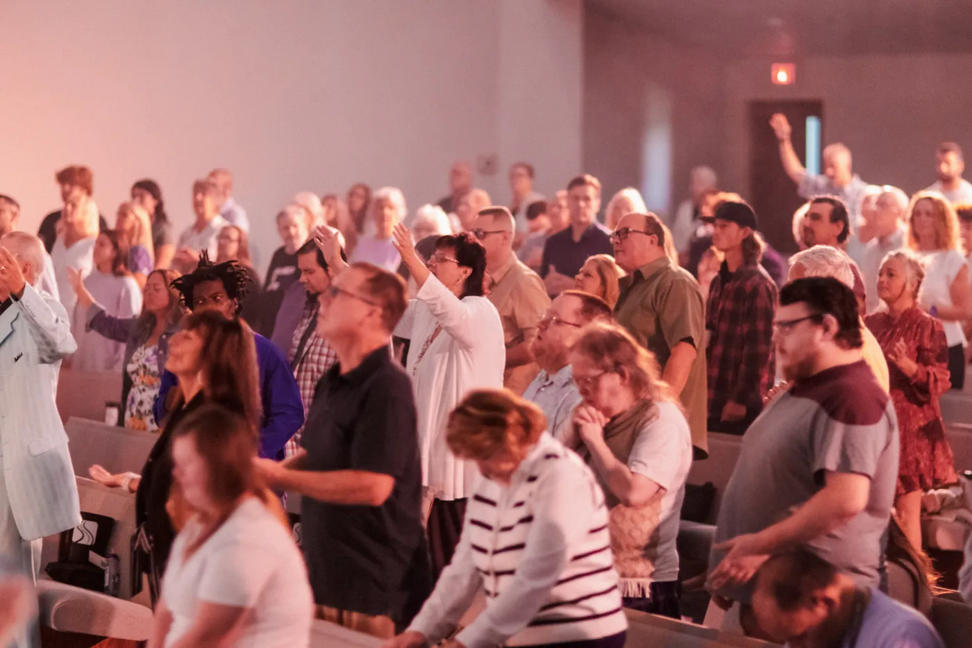 A full room worshipping together on a Sunday morning